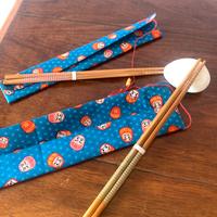 Bacchette giapponesi con custodia motivo Daruma