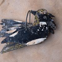 antichi richiami in latta per uccelli