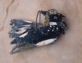 antichi richiami in latta per uccelli