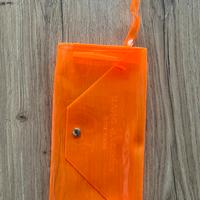 Pochette Marc Jacobs arancione trasparente