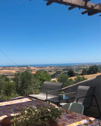 Casale con vigneto e terreni,