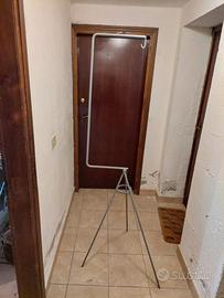 Trespolo per gabbia uccelli