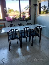 tavolo in cristallo con 6 sedie