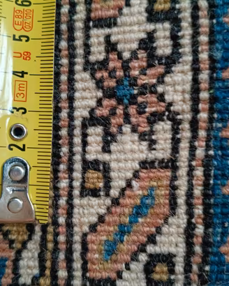tappeto orientale disegno caucasico 