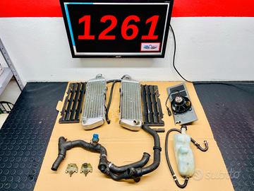 RADIATORI VENTOLA TUBI TERMOSTATO GRIGLIE HUSQVARN