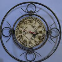 Orologio da parete in ferro battuto