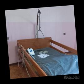 Letto ortopedico elettrico + due materassi