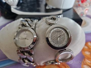 orologi GUESS e FOSSIL