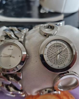 orologi GUESS e FOSSIL