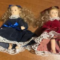 2 bambole in ceramica e velluto