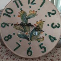 Orologio da parete in terracotta fatto a mano