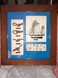 Quado con  barca a vela e nodi marinari.