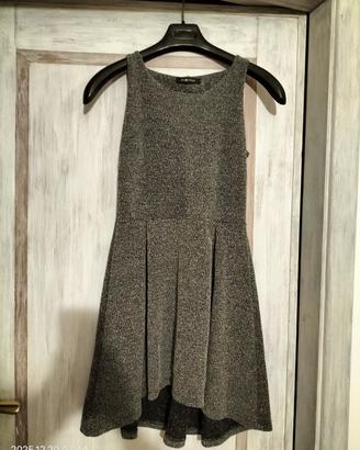 Vestito smanicato assimetrico 