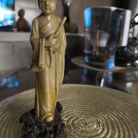 statua orientale antica 