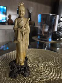 statua orientale antica 