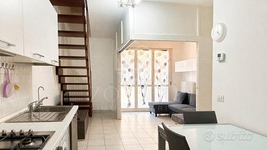 Appartamento con terrazzo e posto auto