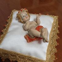 Bambinello artigianale prezioso con corallo 