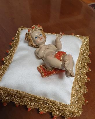 Bambinello artigianale prezioso con corallo 