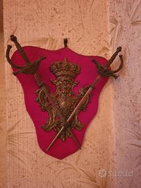 Panoplia ornamento con piccole spade