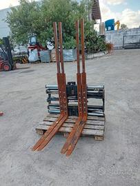 Posizionatore per muletto a 4 forche