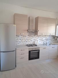 Fiumicino centro trilocale con giardino