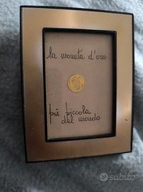 la moneta più piccola del mondo