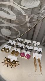 12 paia di orecchini