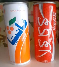 Lattine di Fanta e Coca-Cola in Arabo