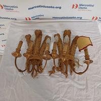 Coppia di applique in legno dorato