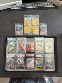 10 carte gradate Pokemon + promo sealed + pikachu