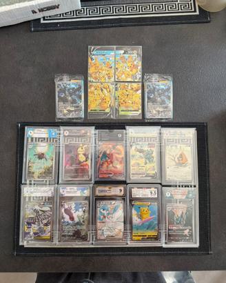 10 carte gradate Pokemon + promo sealed + pikachu