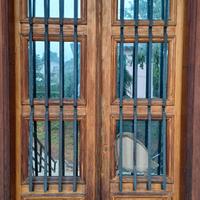 PORTA DOPPIA IN LEGNO CON INFERRIATE IN FERRO