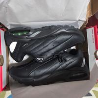 scarpe Nike Nocta in pelle nera 