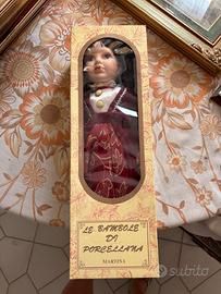 Bambola da collezione in ceramica
