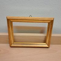 Cornice in legno color oro