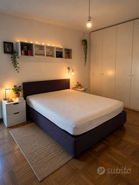 Letto matrimoniale contenitore con doghe in legno
