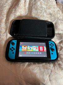 Bundle Nintendo switch + 5 giochi + garanzia usato