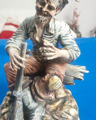 statuetta cacciatore in ceramica Capodimonte 