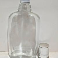 Bottiglia fiaschetta in vetro trasparente vintage