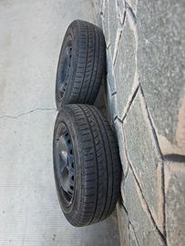 4 Cerchi in ferro con gomme estive usate .