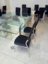 Tavoli in cristallo con sedie