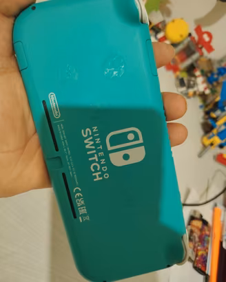 Nintendo Switch lite turchese -perfetta-Scicli