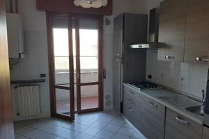 Appartamento con giardino e garage