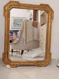 Specchio con cornice in legno dorata anticata