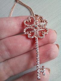 Ciondolo acciaio dorato con zirconi 🔑 