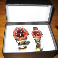 coppia di orologi uomo donna