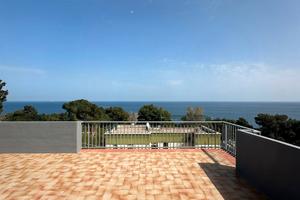 Attico vista mare con posto auto privato