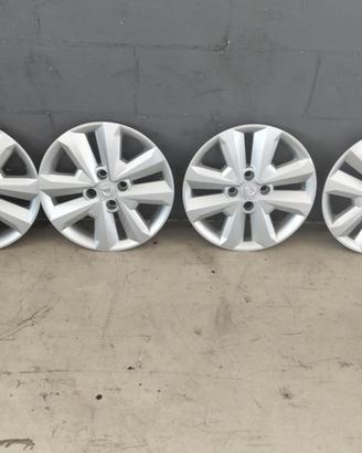 DACIA 4 calotte copricerchi + vasca baule