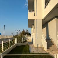 Appartamento sul mare con giardino