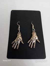 orecchini simboli occulti 